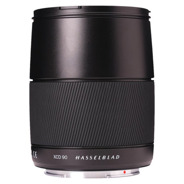 Hasselblad XCD 90mm f3.2 lens standing upright, side view showing XCD 90 and Hasselblad markings