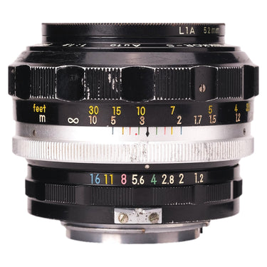 Nikon Nikkor-S 55mm f1.2 side view showing focus scale, aperture ring, and 52mm filter