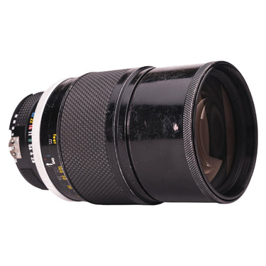 Nikon 180mm f2.8 Nikkor-P side view showing focus and aperture rings and distance scale
