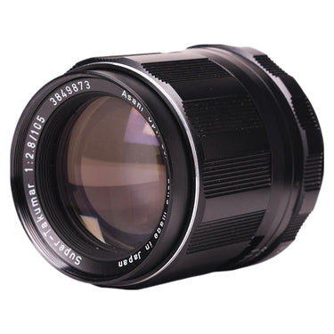 Pentax Super-Takumar 105mm f2.8 front three-quarter view with clear glass