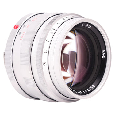 Leica 50mm Summilux-M silver front view with aperture ring and depth-of-field scale