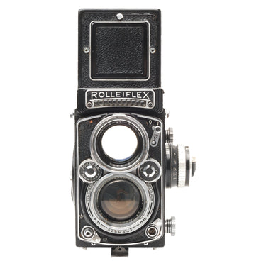 Rolleiflex 2.8E front view showing Planar taking lens and Heidosmat viewing lens