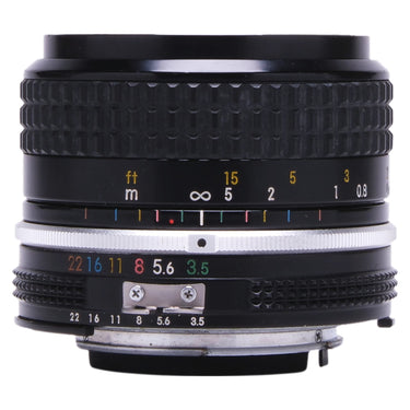 Nikon 28mm f3.5 AI Nikkor lens side view showing focus and aperture rings and depth of field scale