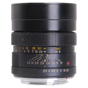 Leica 90mm f2.8 Elmarit-R side view with lens hood extended and distance scale