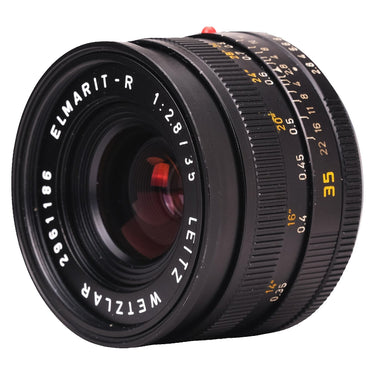 Leica Elmarit-R 35mm f2.8 angled front view with distance and aperture scales
