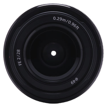 Sony FE 28mm f2 lens front element straight-on view