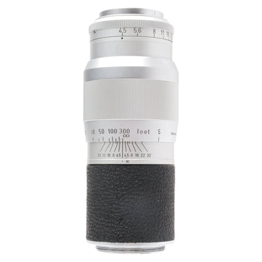 Leica 13.5cm f4.5 Hektor lens standing upright, aperture and distance scales at top