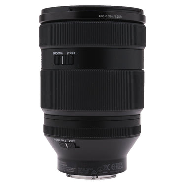 Sony FE 28-70mm f2 GM side with smooth/tight and click on-off switches and serial number
