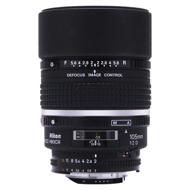 Nikon AF DC-Nikkor 105mm f2 D lens front view showing Defocus Image Control ring and aperture scale