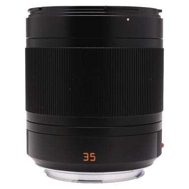 Leica Summilux-TL 35mm f1.4 standing upright with hood, showing focus ring and orange 35 marking