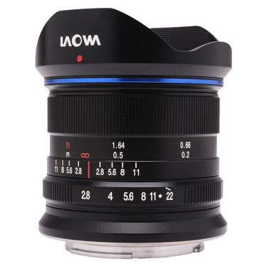 Laowa 9mm f2.8 Zero-D front three-quarter view with petal hood and aperture and distance scales