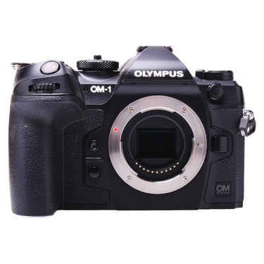 Olympus OM-1 front view with bare Micro Four Thirds mount and sensor exposed