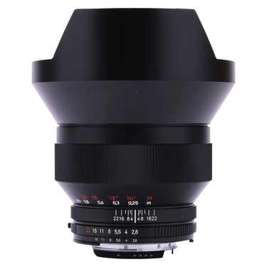 Carl Zeiss 15mm f2.8 Distagon ZF.2 front three-quarter view with built-in petal hood and distance scale