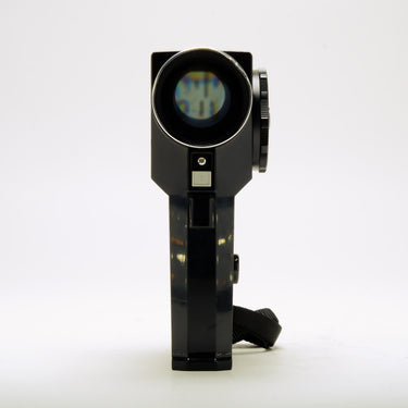Pentax Spotmeter V front view showing metering cell, B button, and attached strap