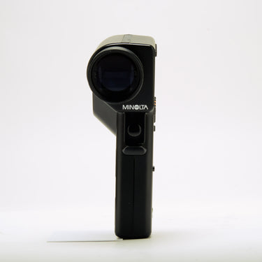 Minolta Spotmeter F light meter side view with viewing barrel and MINOLTA logo