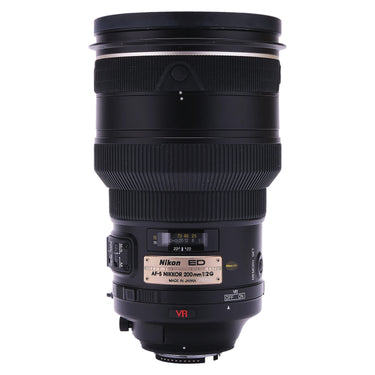 Nikon 200mm f2G ED VR standing upright, name plate and focus distance window with switches
