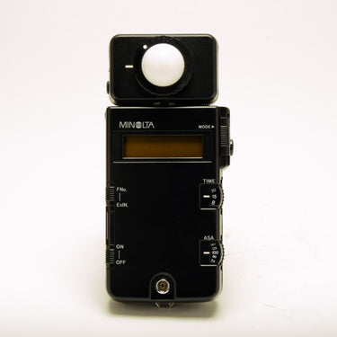 Minolta Flash Meter III front view with LCD display, MODE dial, TIME and ASA dials