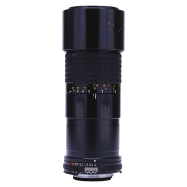 Nikon 200mm f4 Micro-Nikkor lens standing upright showing barrel and mount at base