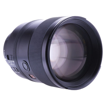 Sony FE 135mm f1.8 GM angled view of front element and barrel