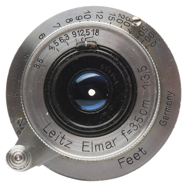 Leica Elmar 3.5cm f3.5 front view with Leitz Elmar engraving, distance scale, and front element