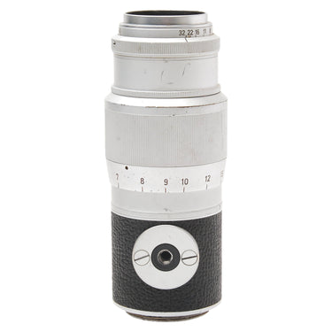 Leica Hektor 135mm lens side view showing tripod foot collar and focus index