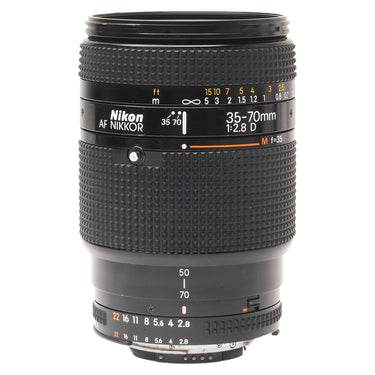 Nikon 35-70mm f2.8 D AF Nikkor lens standing upright, front three-quarter view with focus distance scale and markings