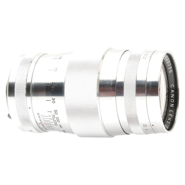 Canon 135mm f3.5 lens side view with Canon Lens engraving and distance scale