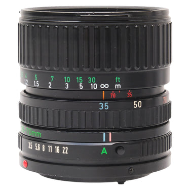 Canon FD 35-70mm f3.5-4.5 zoom lens side view showing focus, zoom and aperture rings with distance scale