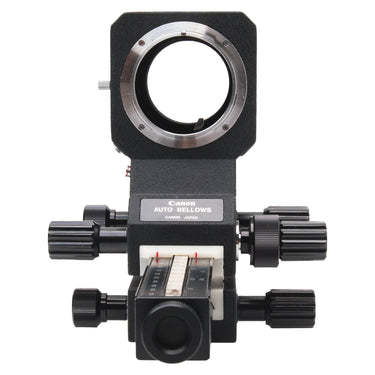 Canon FD Auto Bellows front view showing lens mount ring, control knobs, and Auto Bellows badge