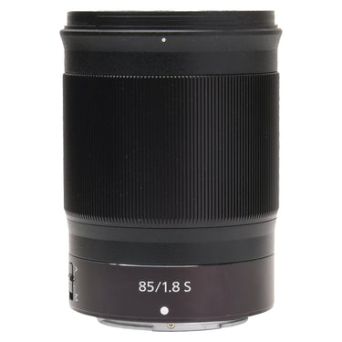 Nikon Z 85mm f1.8 S lens standing upright showing 85/1.8 S barrel marking