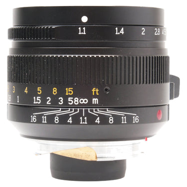 7Artisans 50mm f1.1 side view showing aperture scale and focus distance markings