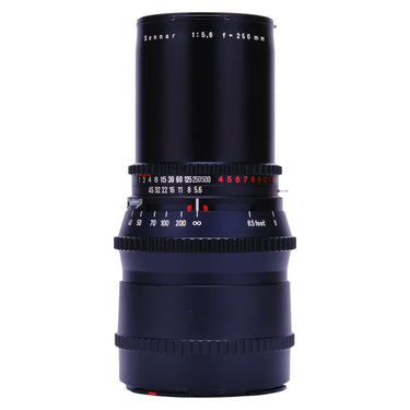 Hasselblad C 250mm f5.6 Sonnar T* lens standing upright, front barrel with Sonnar 250mm engraving