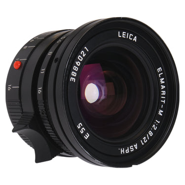 Leica Elmarit-M 21mm f2.8 ASPH angled front view with red focus index and clear glass