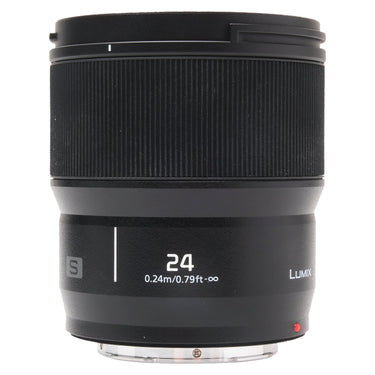 Panasonic Lumix S 24mm f1.8 lens standing upright showing focal length markings