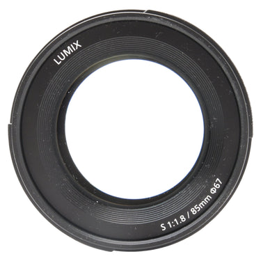 Panasonic Lumix S 85mm f1.8 front element with LUMIX branding and 67mm filter thread