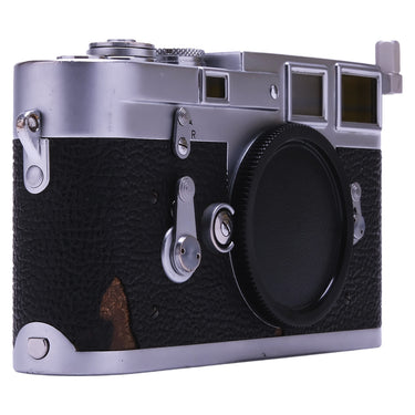 Leica M3 DS front three-quarter view with black body cap mounted on the lens mount