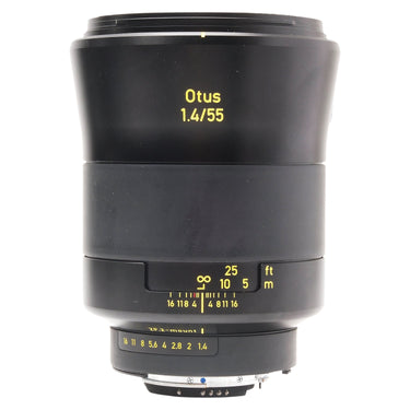 Zeiss Otus 55mm f1.4 standing upright, front view showing Otus 1.4/55 marking and lower mount