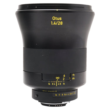 Zeiss Otus 1.4/28 lens front three-quarter view showing barrel and focus scale