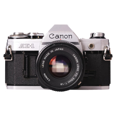 Canon AE-1 front view with Canon FD 50mm f1.8 lens mounted