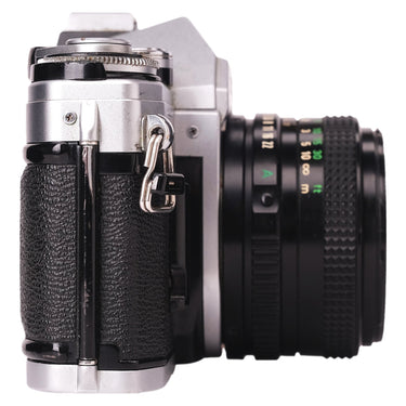 Canon AE-1 right side view showing lens aperture ring and grip