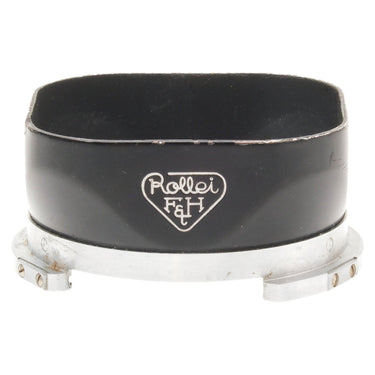 Rollei F&H bayonet lens shade, front view showing embossed logo and metal bayonet mount