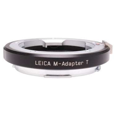 Leica M-Adapter T front view showing M-mount bayonet, release lever, and engraved name