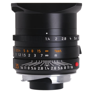 Leica Summilux-M 35mm f1.4 ASPH front three-quarter view with built-in hood and aperture and distance scales