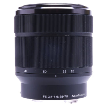 Sony FE 28-70mm OSS zoom lens front barrel with 28-70 zoom scale, front uncapped
