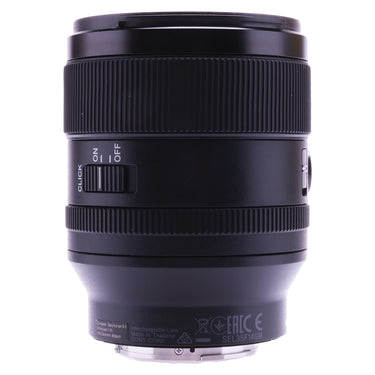 Sony FE 35mm f1.4 GM side view showing click de-click ON/OFF switch and part number