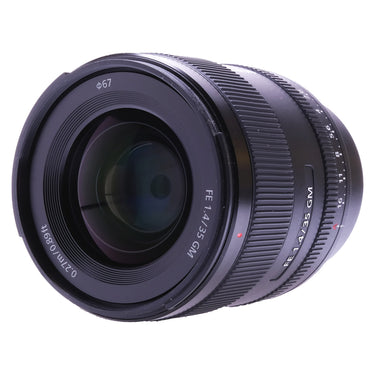 Sony FE 35mm f1.4 GM angled front view of the front glass element
