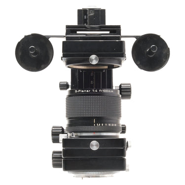 Contax 100mm f4 S-Planar lens mounted on Auto Bellows with aperture scale visible