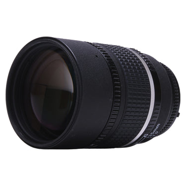 Nikon 135mm f2 AF DC-Nikkor angled view showing front element and focus scale