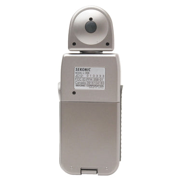 Sekonic L-358 rear view showing model label, serial number, and battery door