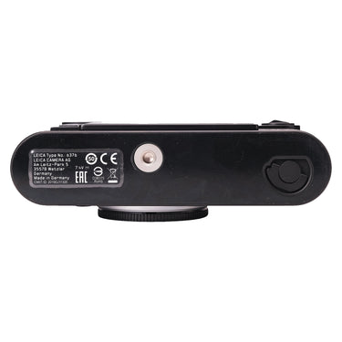 Leica M10 bottom plate showing tripod socket, battery release and light scratches